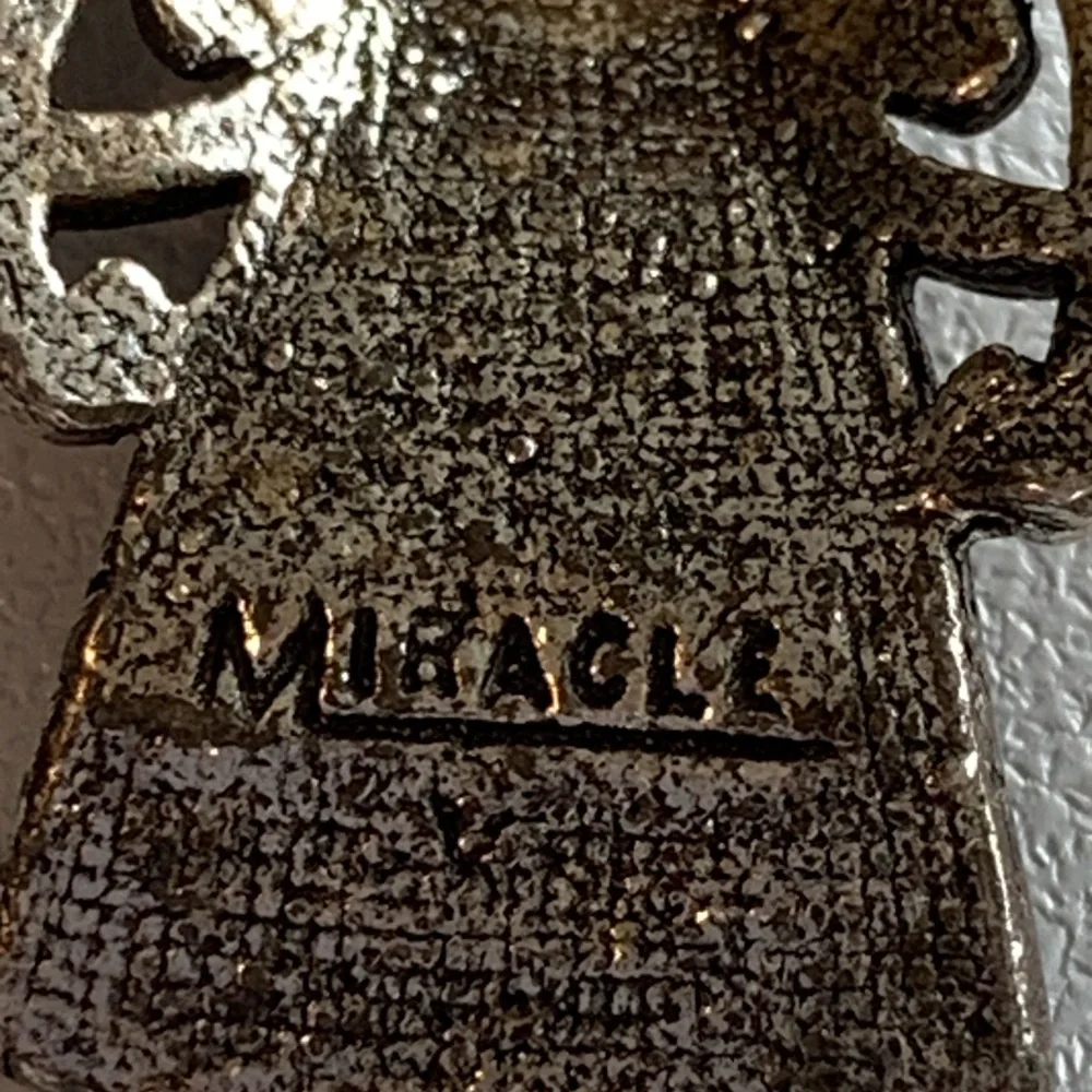 Scottish signed Miracle brooch.